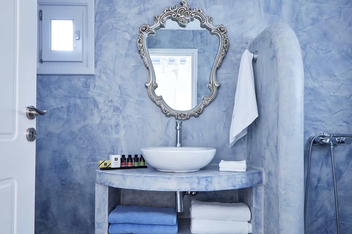 Shower, designer toiletries, hair dryer, bathrobes