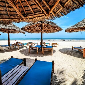 Private beach, sun loungers, beach umbrellas, beach bar