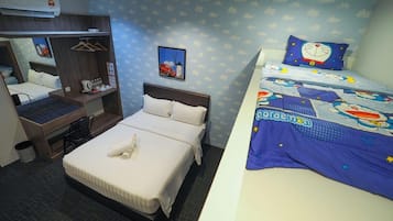 A hotel room with a bed, a desk, and a wardrobe.