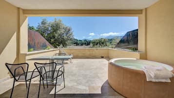 Deluxe suite, bubbelbad | Terras