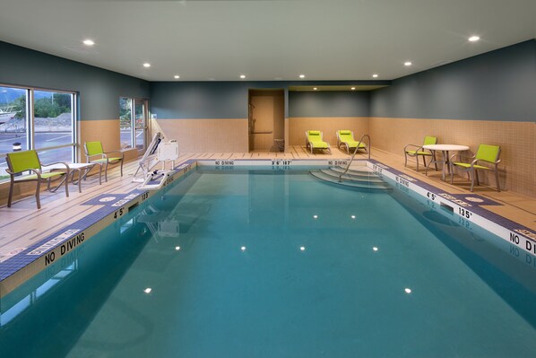 Indoor pool, open 7 AM to 10 PM, pool loungers