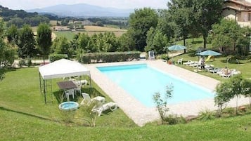 Outdoor pool, open 9:00 AM to 7:30 PM, pool umbrellas, pool loungers