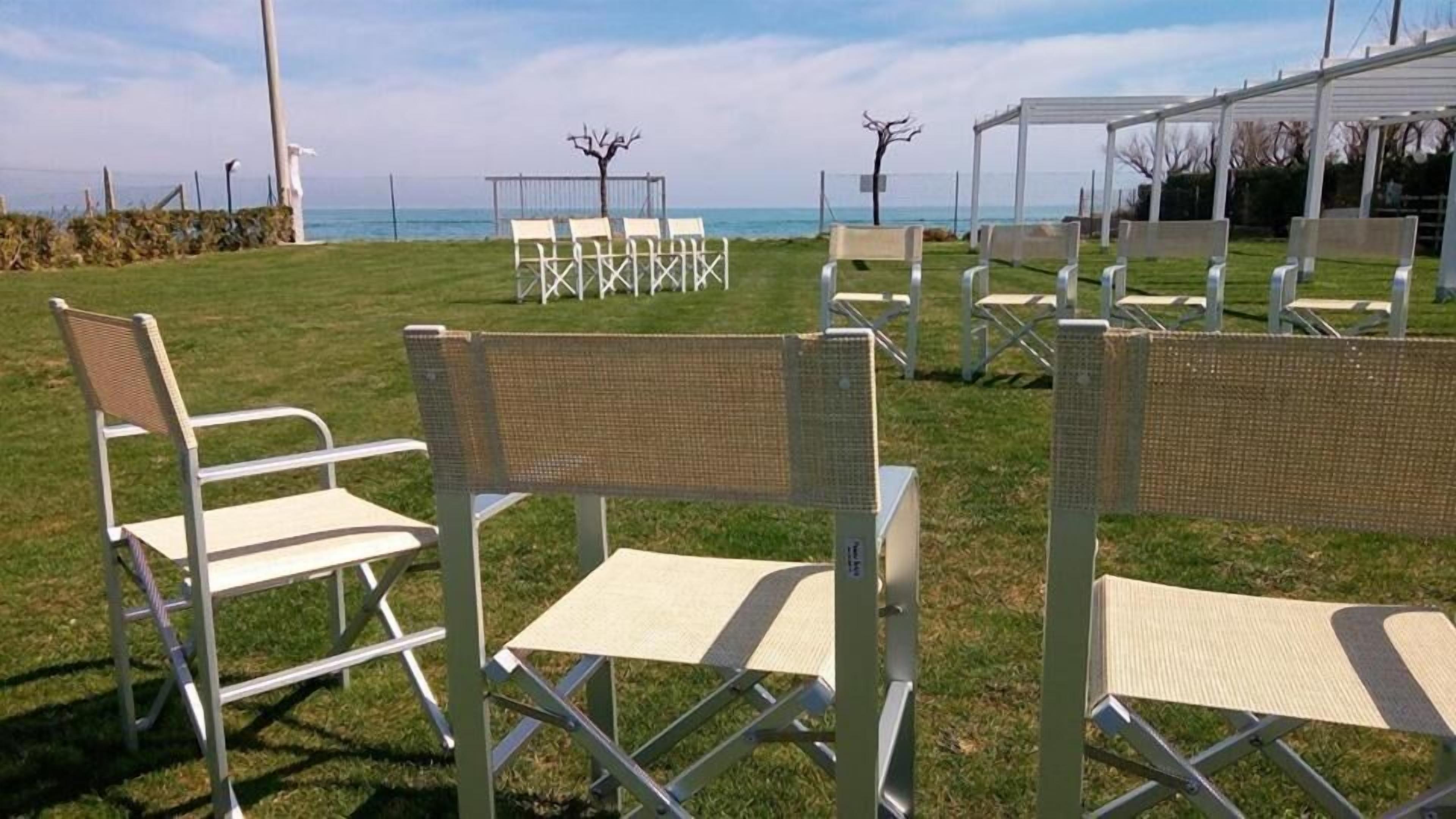 Outdoor seating with a view of the ocean.