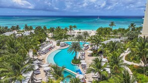 Outdoor pool, pool cabanas (surcharge), pool umbrellas - Kimpton Seafire Resort + Spa by IHG (Seven Mile Beach)