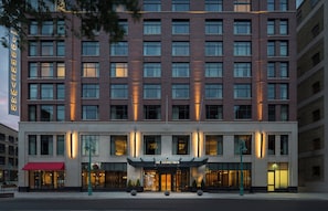 A multi-story hotel with a prominent entrance and a sign reading 'The Journeyman.' - Kimpton Journeyman Hotel by IHG (Milwaukee)