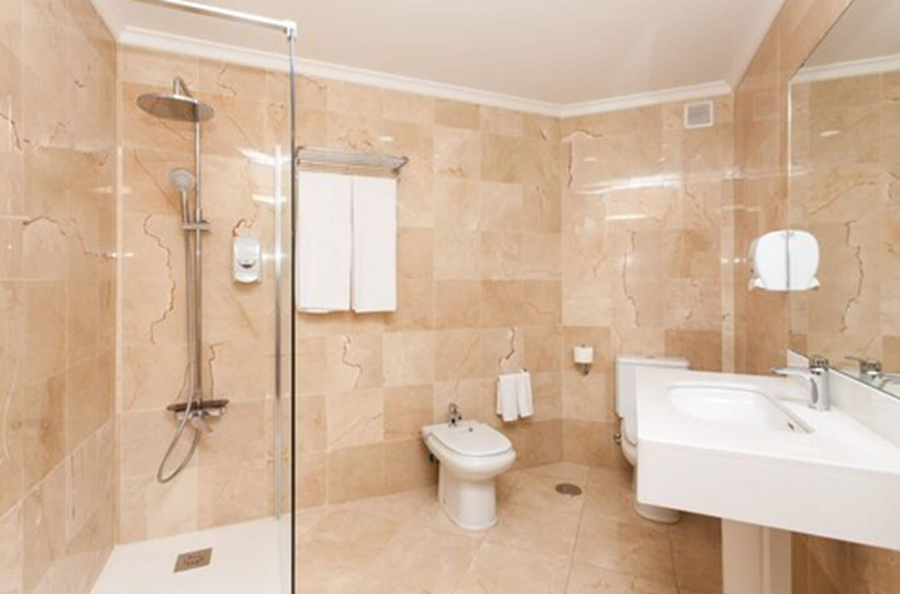 free toiletries, hair dryer, bidet, towels