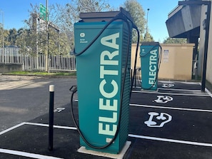 A parking area with ELECTRA charging stations.