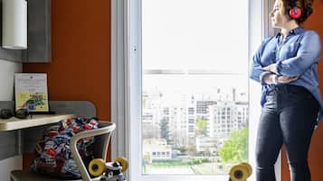 Desk, soundproofing, iron/ironing board, free cribs/infant beds