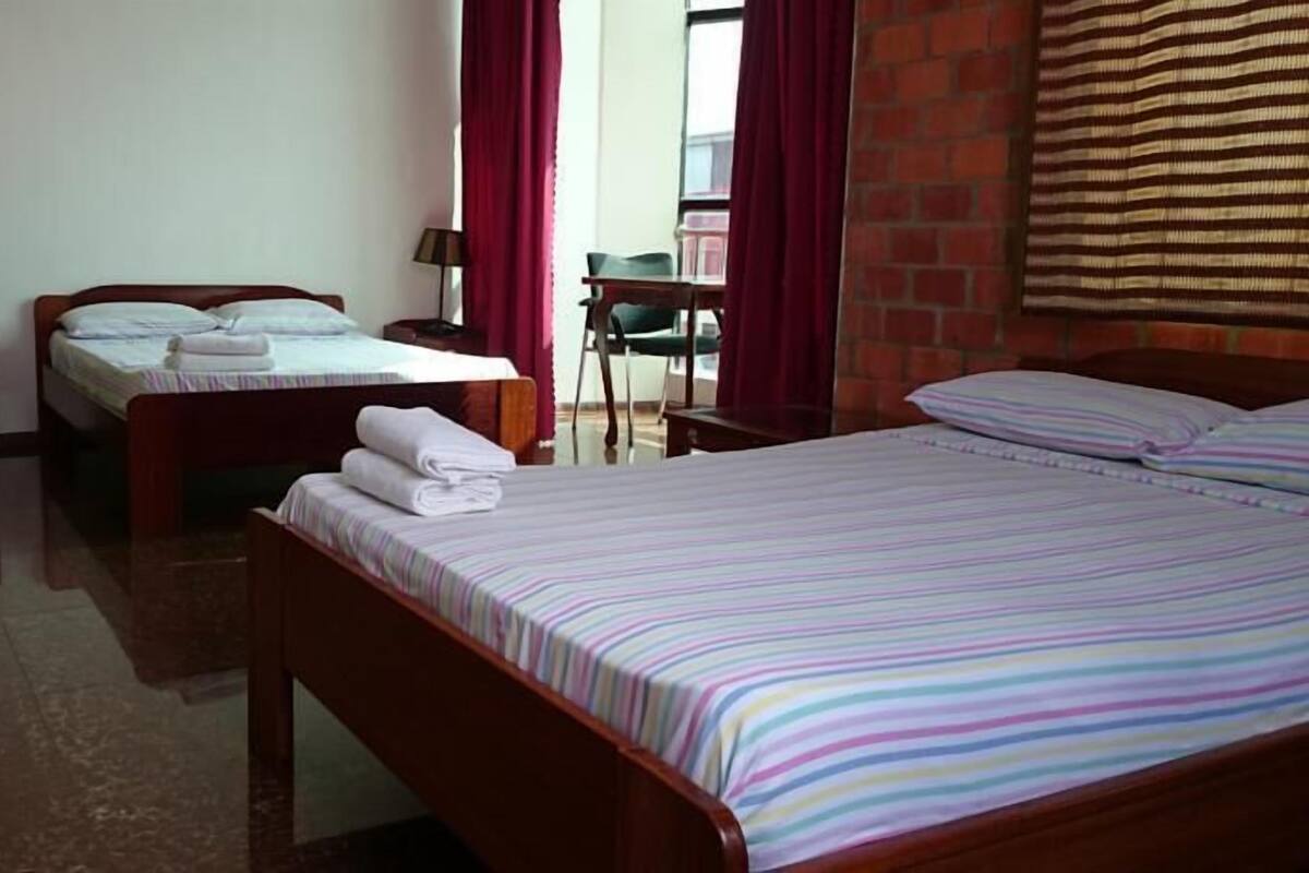 Quadruple Room | In-room safe, desk, blackout drapes, soundproofing