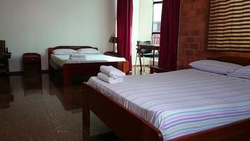 Quadruple Room | In-room safe, desk, blackout drapes, soundproofing