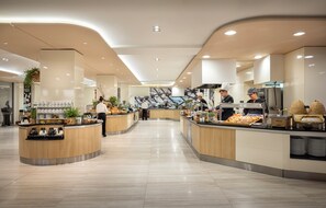 A modern, well-lit food court with multiple counters, each stocked with various food items and beverages. - Isabella Island Resort Valamar Collection 4 (Porec)