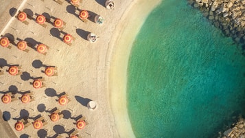 Beach volleyball, sailing, motor boating