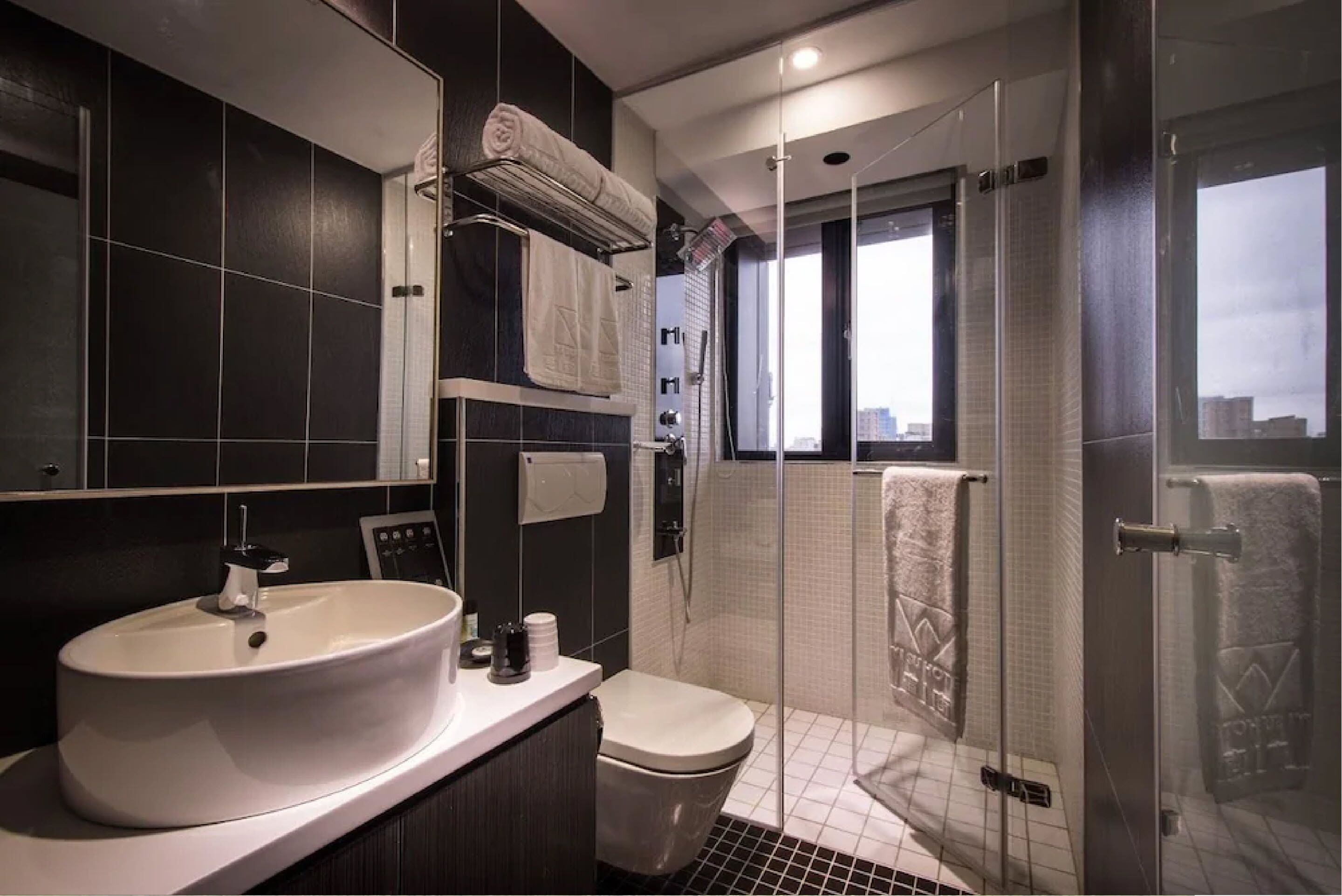 Shower, hair dryer, towels, toilet paper