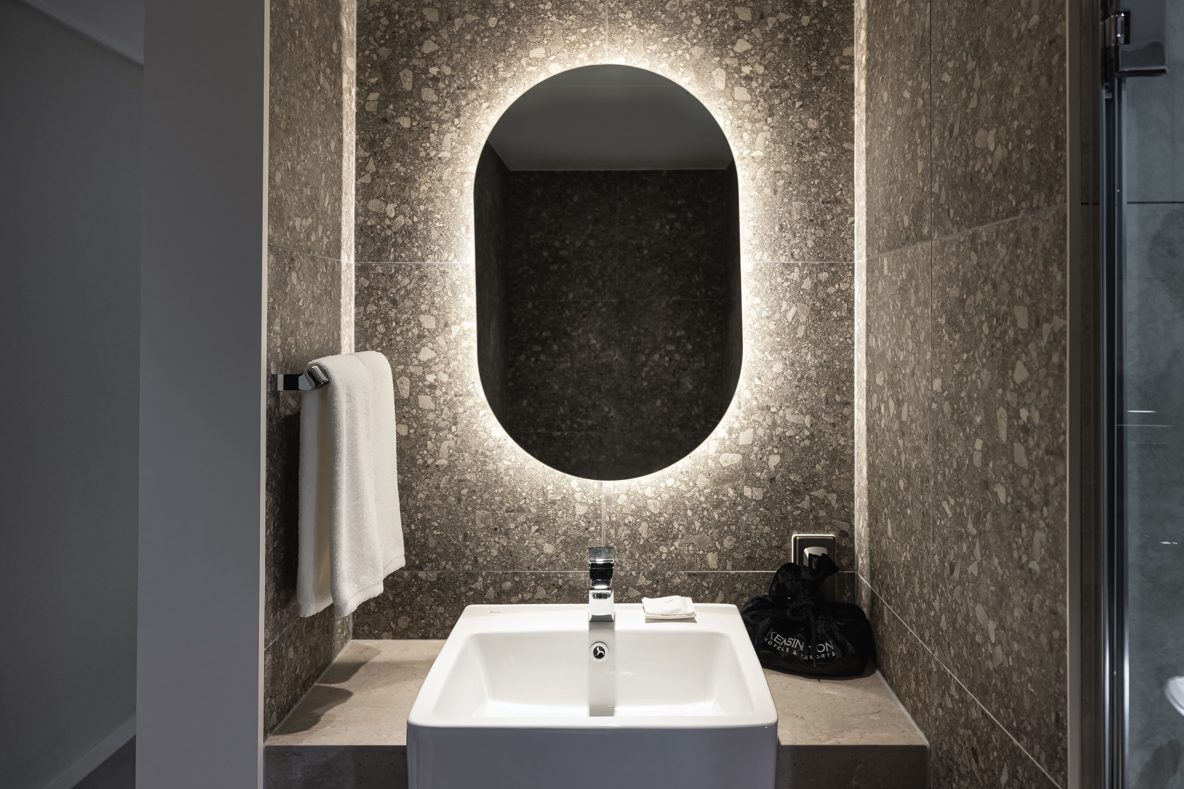 combined shower/bathtub, deep-soaking bathtub, hair dryer, slippers