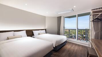 Noblian Ocean View | 1 dormitorio, edredones de plumas, caja fuerte y wifi gratis