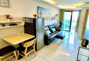 Condo luxo, vista para o mar | Área de estar