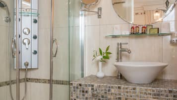 Suite, 2 Bedrooms, Partial Sea View | Bathroom | Shower, free toiletries, hair dryer, slippers