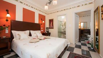 Suite, 2 Bedrooms, Partial Sea View | In-room safe, soundproofing, iron/ironing board, free WiFi