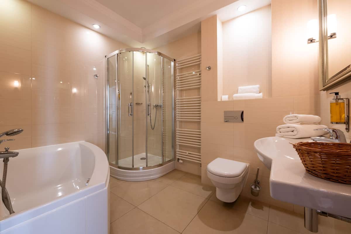 superior room | bathroom | shower, designer toiletries, hair dryer, towels