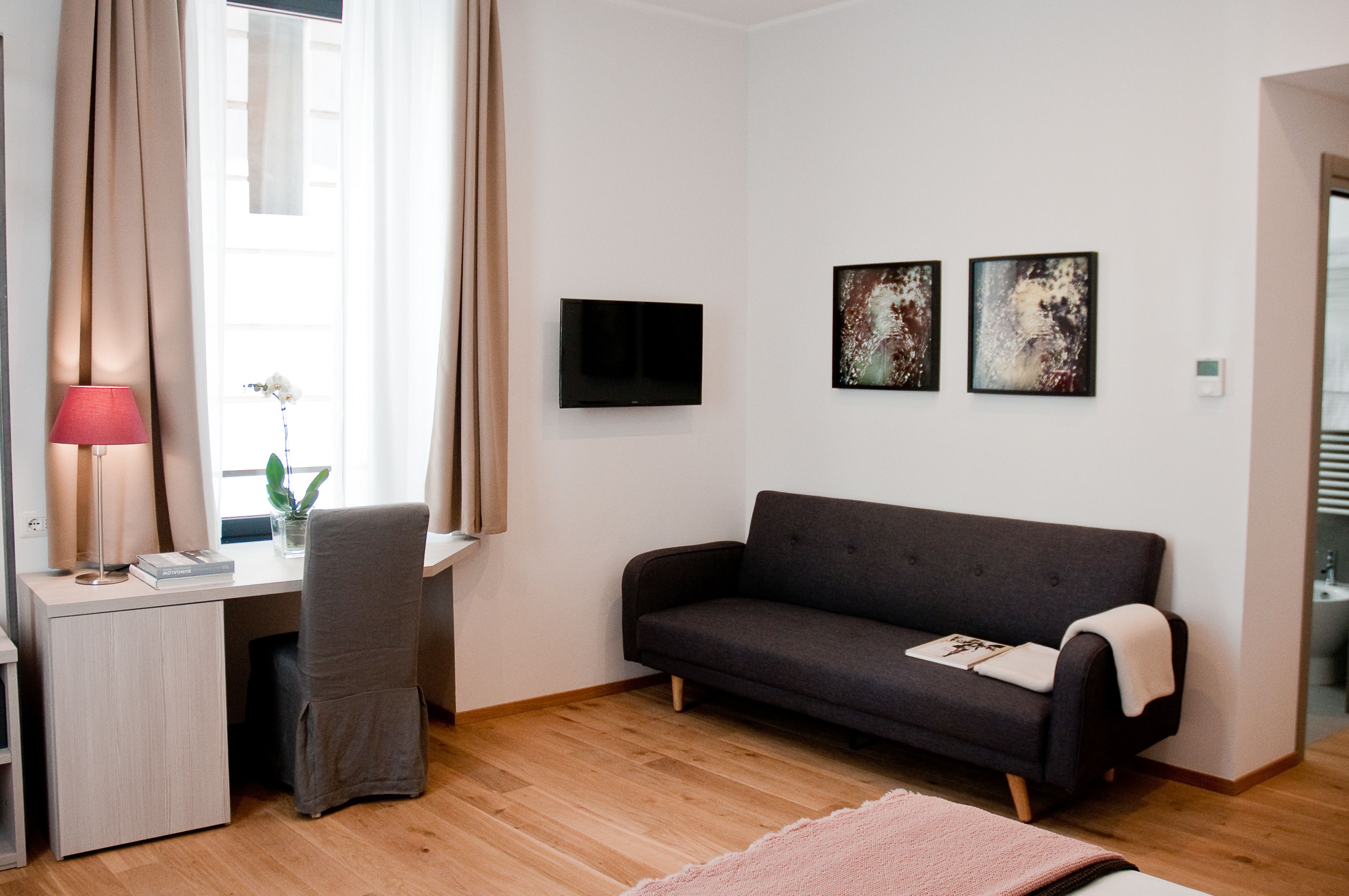 superior double room | living area | lcd tv