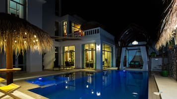 Outdoor pool, pool umbrellas, pool loungers