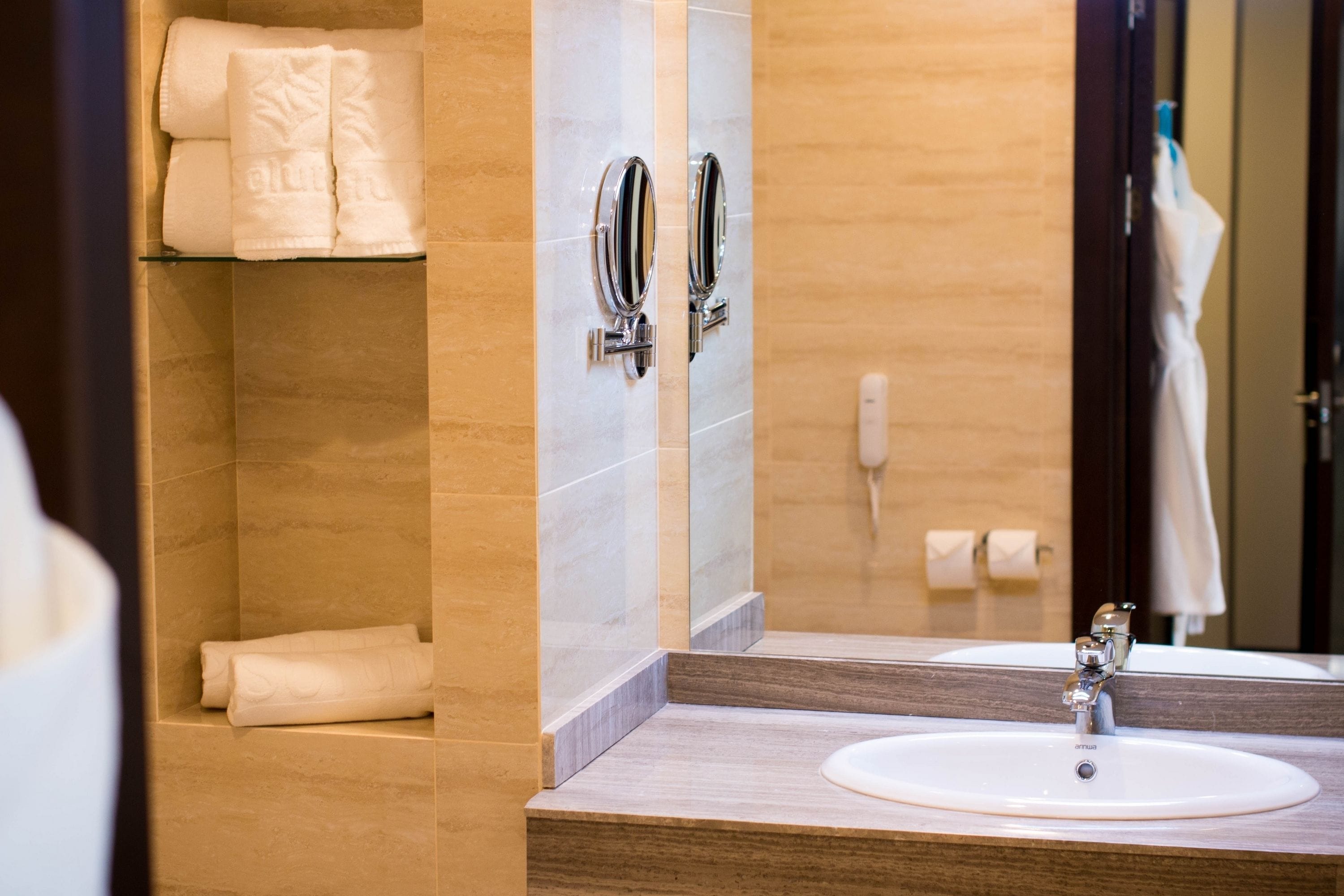 designer toiletries, hair dryer, bathrobes, slippers