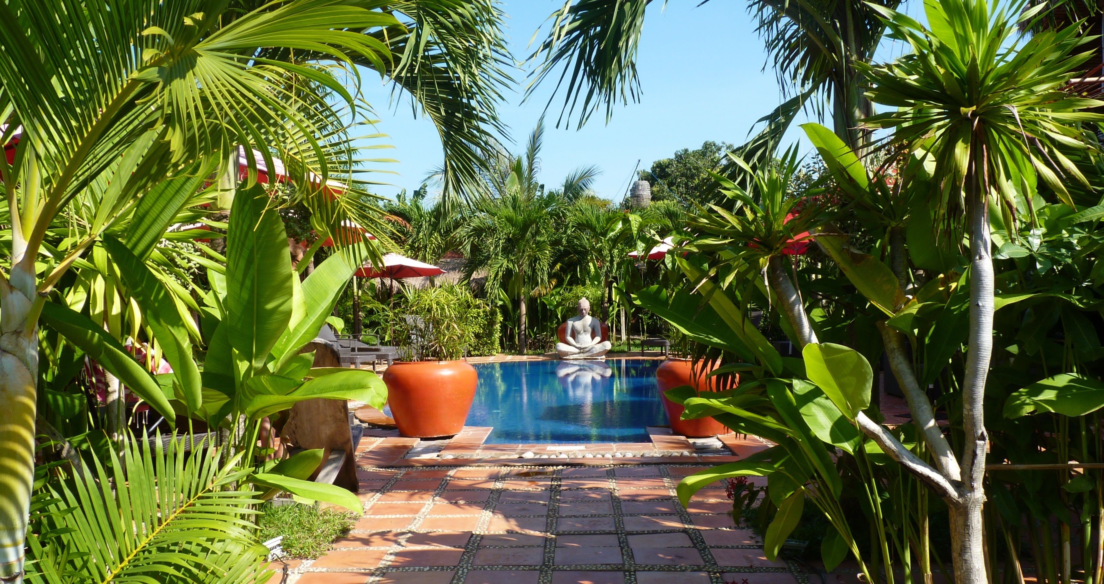 outdoor pool, pool umbrellas, pool loungers