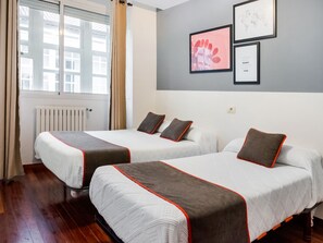 Laptop workspace, blackout curtains, free WiFi, bed sheets