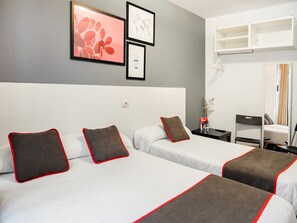 Laptop workspace, blackout curtains, free WiFi, bed sheets
