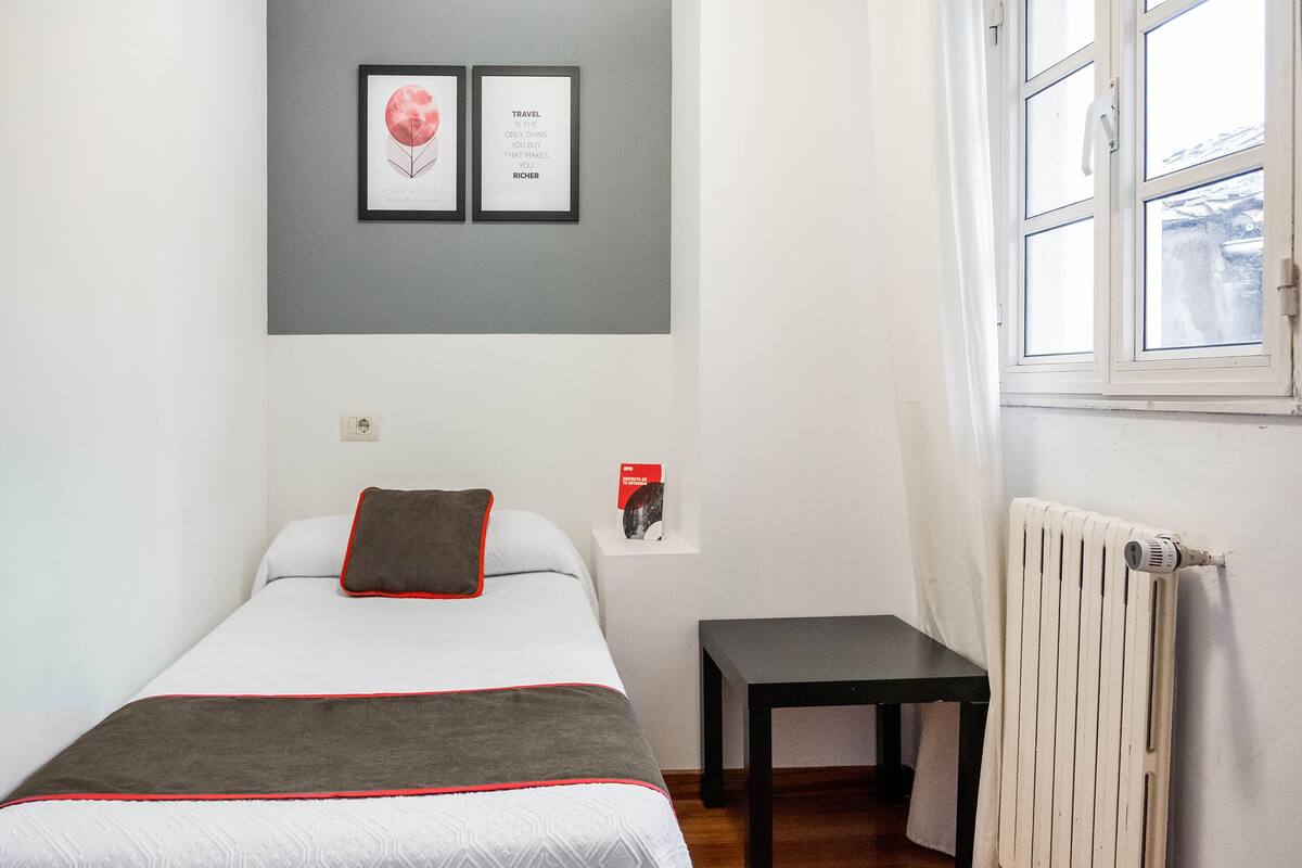 Laptop workspace, blackout curtains, free WiFi, bed sheets