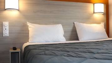 Desk, blackout drapes, WiFi (free), bed sheets
