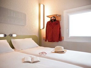 Premium bedding, desk, blackout drapes, iron/ironing board