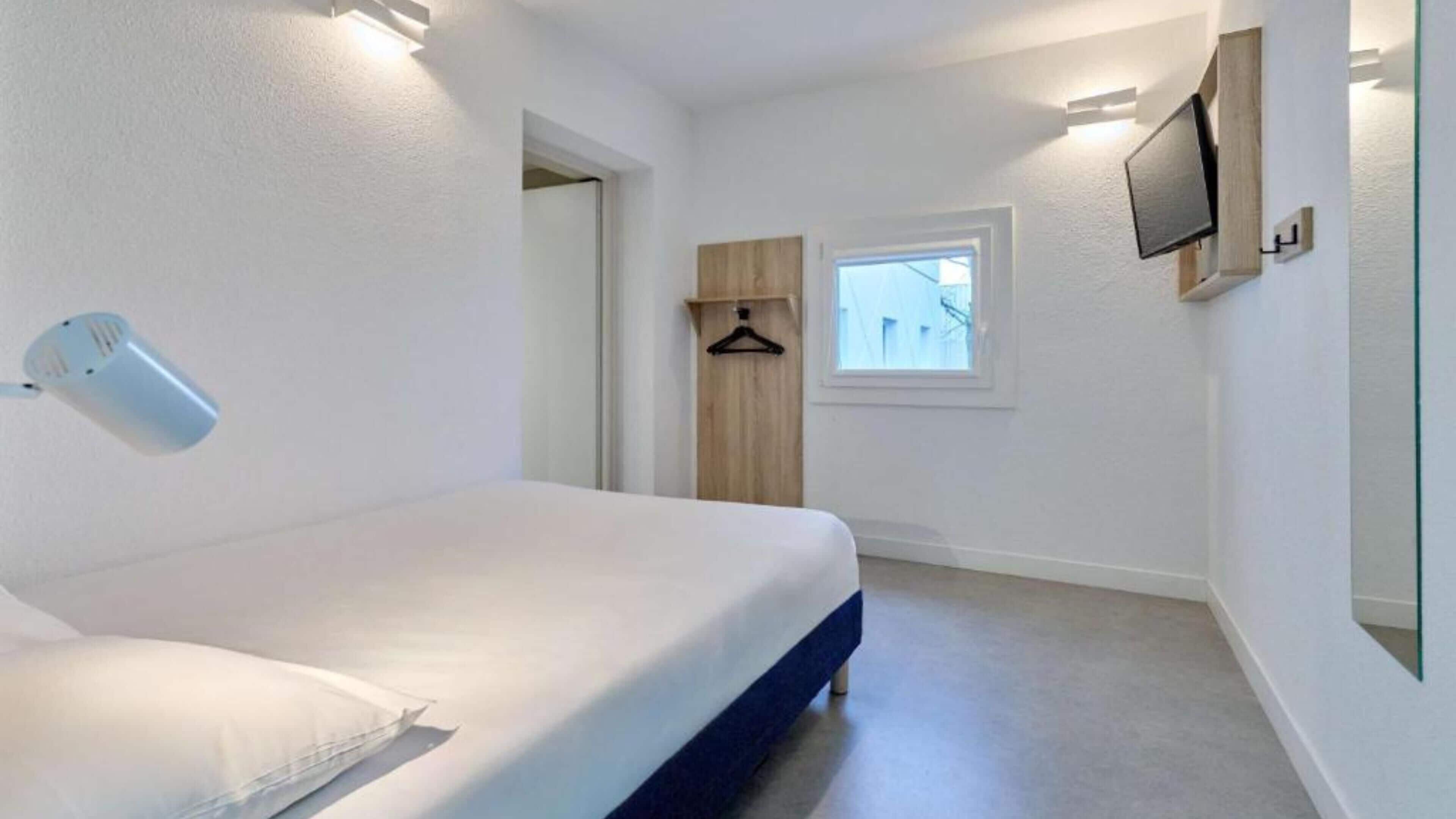 Kamar Standar, Beberapa Tempat Tidur | Seprai premium, meja kerja, Wi-Fi gratis, dan seprai linen