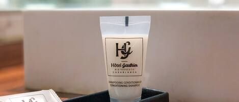 A Hotel Gauthier toiletries package in a black box.