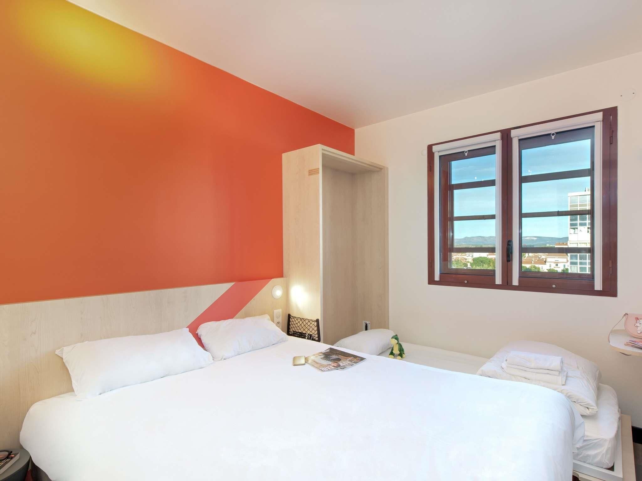 Triple Room (1 Double Bed and 1 Twin Murphy Bed)