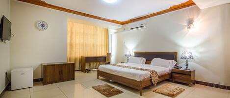 Deluxe Double Room, City View | Premium bedding, minibar, laptop workspace, blackout curtains