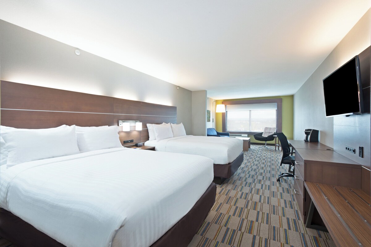Suite, 2 Queen Beds | Hypo-allergenic bedding, desk, laptop workspace, blackout curtains