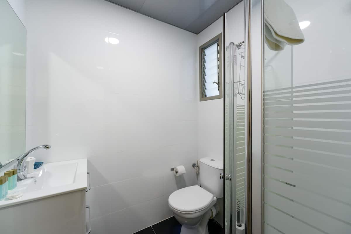 Estudio, vista a la ciudad | 1 habitación, caja de seguridad en la habitación y escritorio