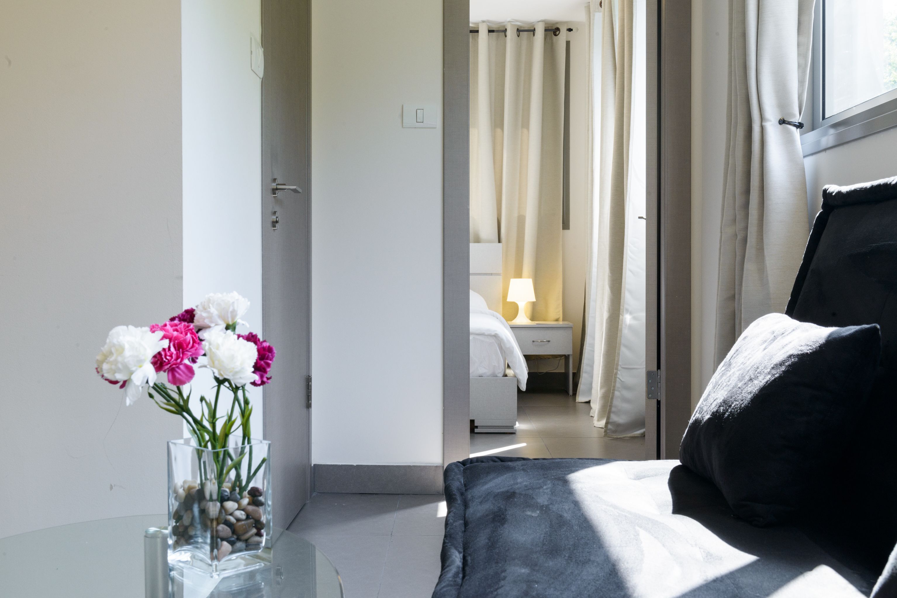 Apartment, 1 Bedroom, City View | Living area | Flat-screen TV