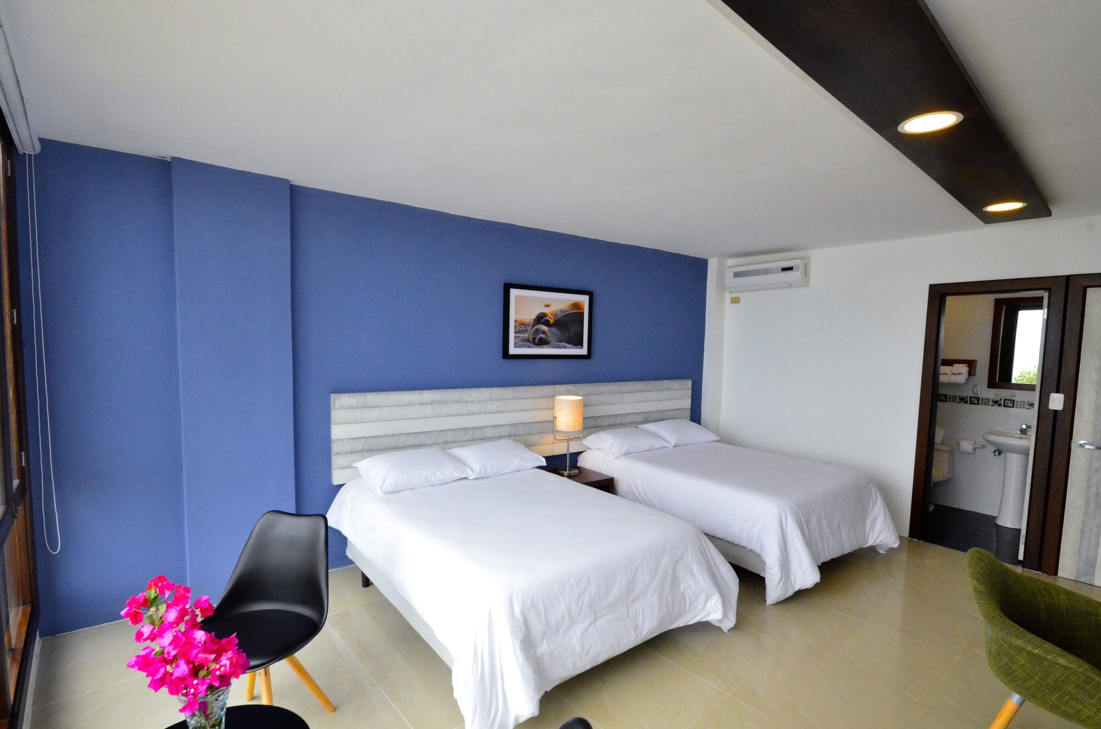 superior triple room, ocean view | premium bedding, down duvets, memory-foam beds, in-room safe