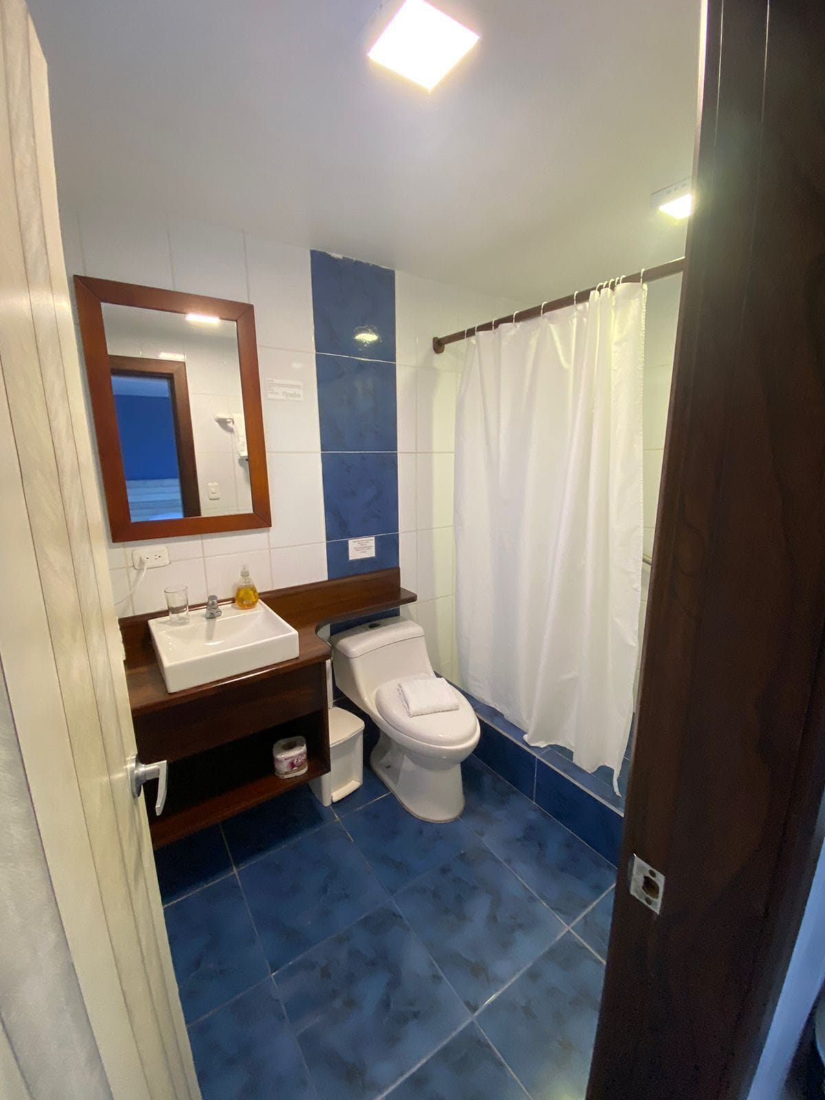 comfort triple room, multiple beds, ocean view | bathroom | shower, rainfall showerhead, hair dryer, towels