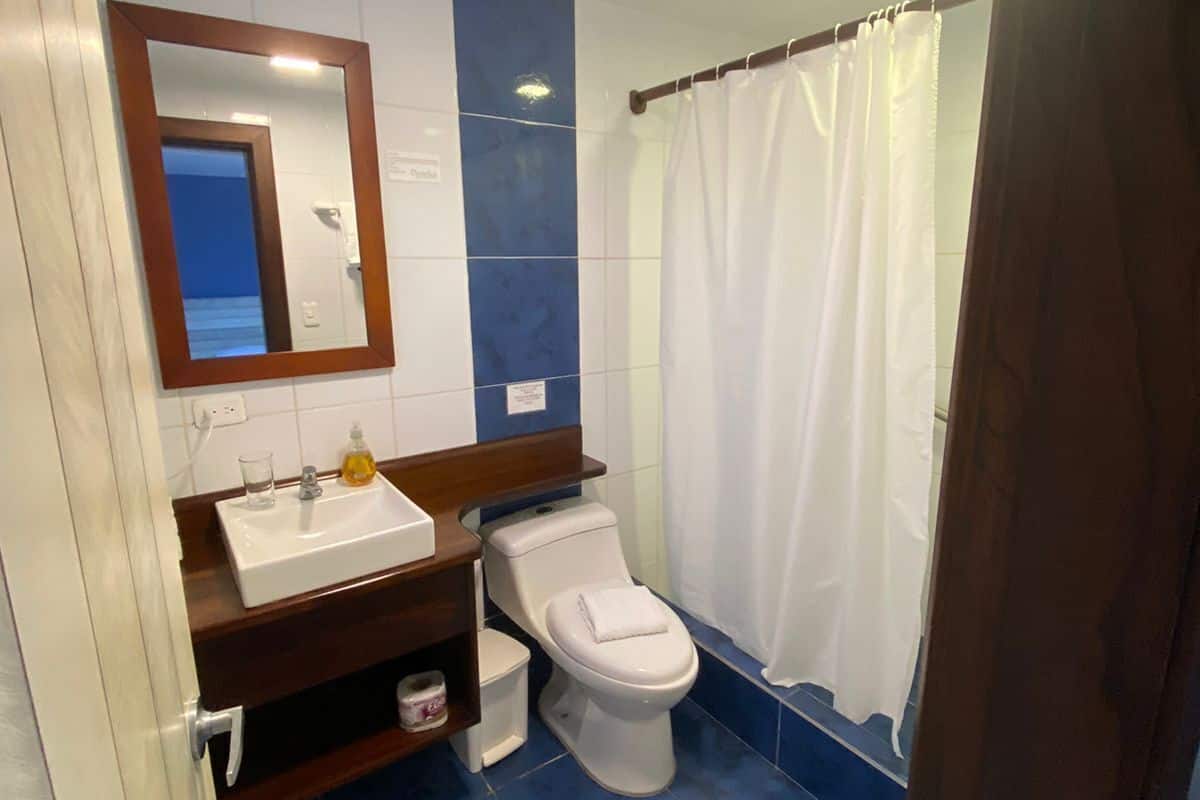 comfort triple room, multiple beds, ocean view | bathroom | shower, rainfall showerhead, hair dryer, towels