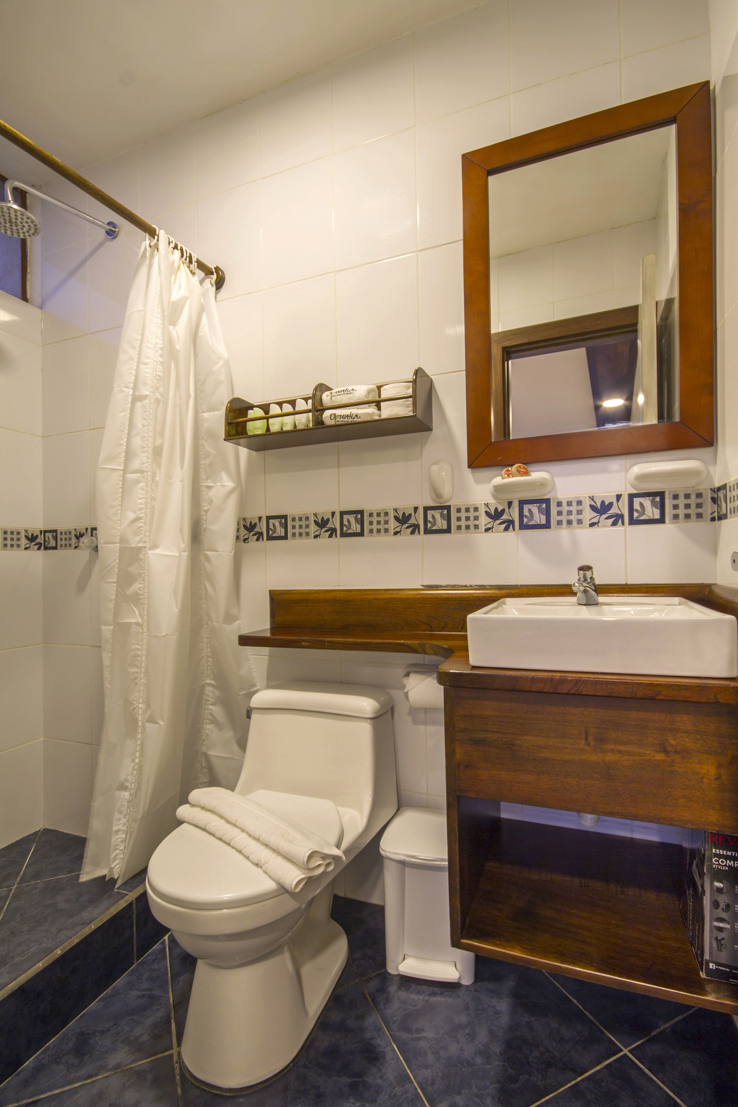 comfort double room, 1 double bed, ocean view | bathroom | shower, rainfall showerhead, hair dryer, towels