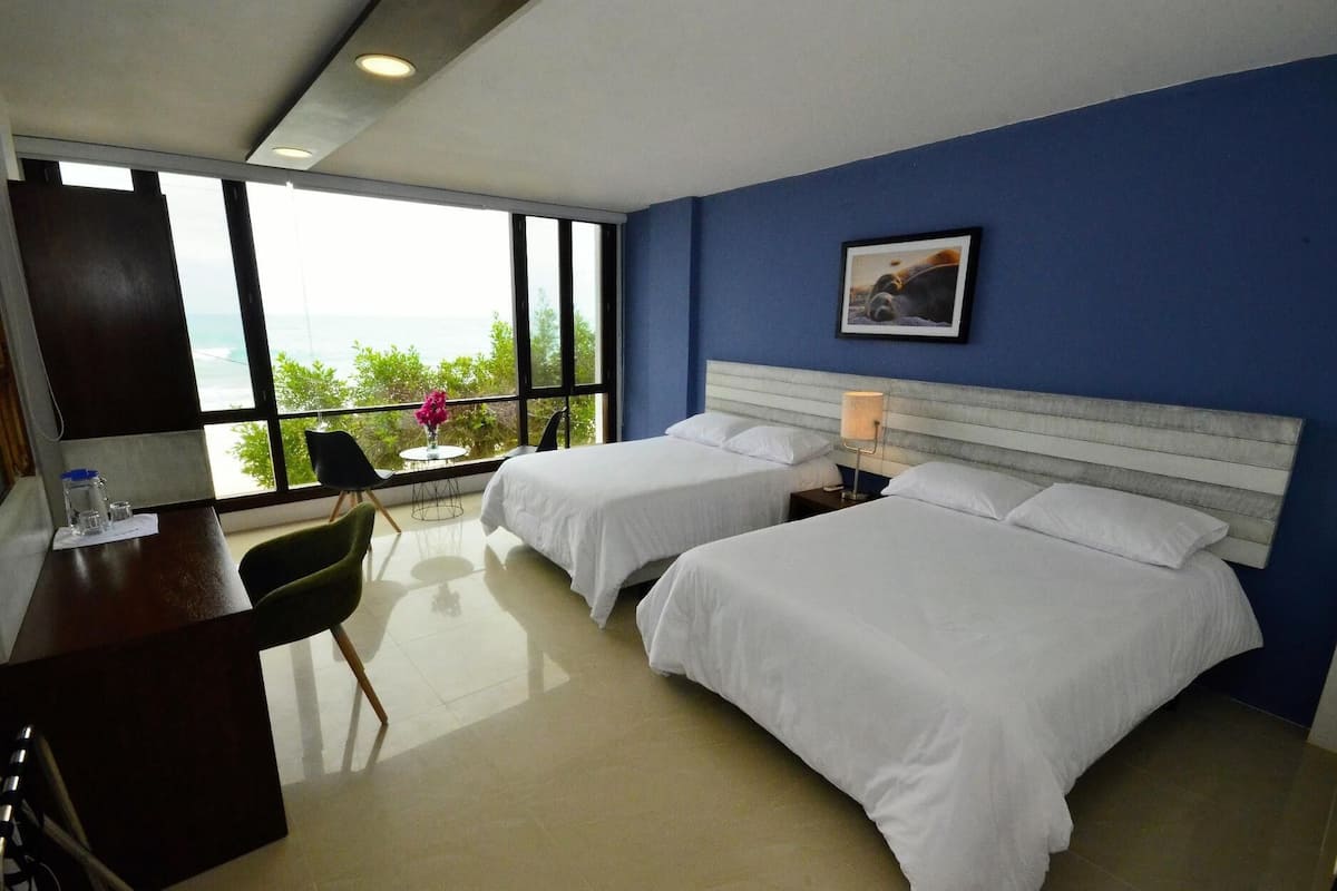 Premium bedding, down duvets, memory-foam beds, in-room safe