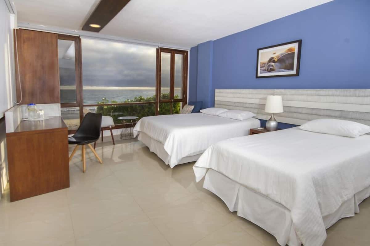 superior triple room, ocean view | premium bedding, down duvets, memory-foam beds, in-room safe