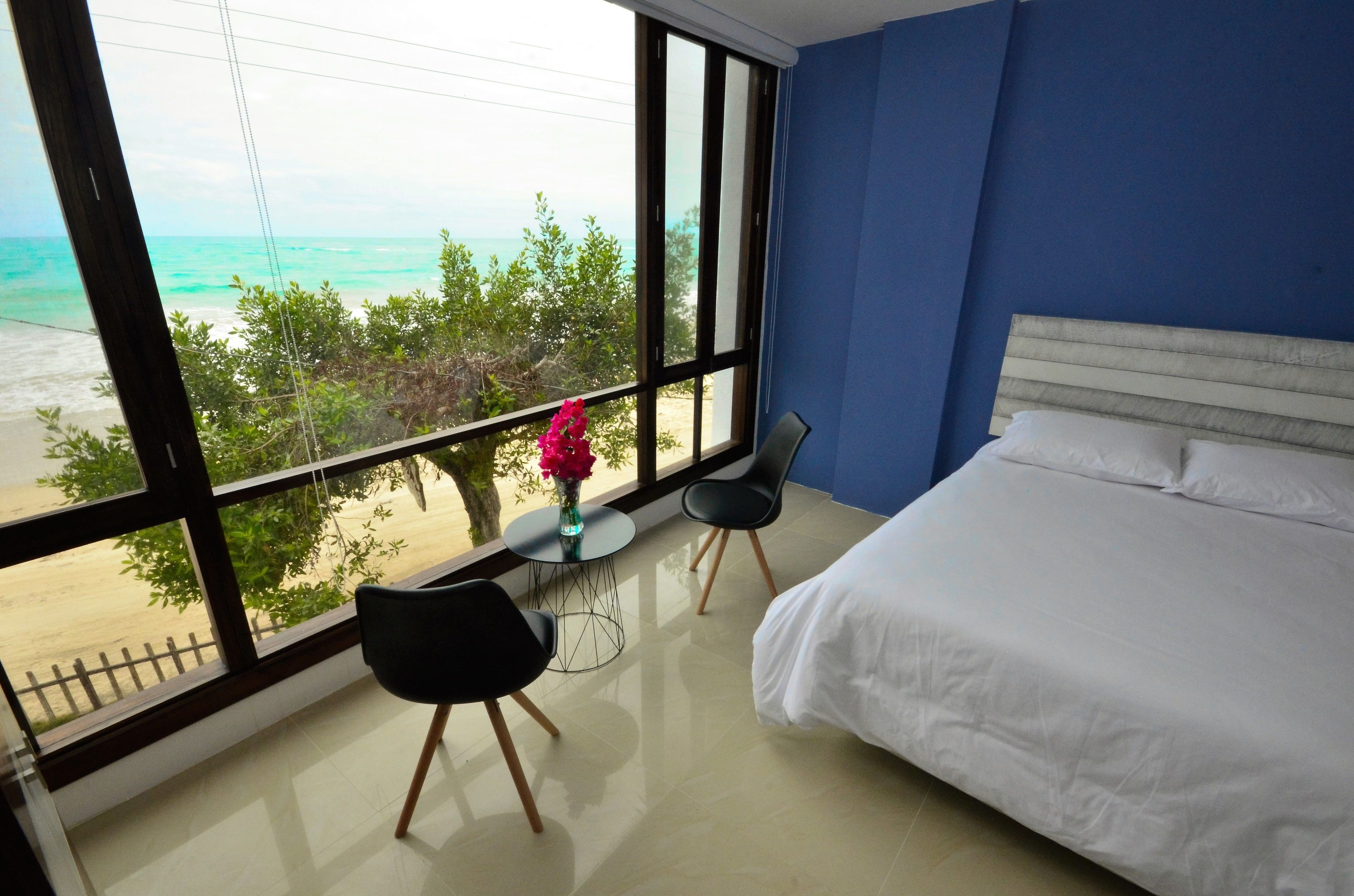 premium bedding, down duvets, memory-foam beds, in-room safe