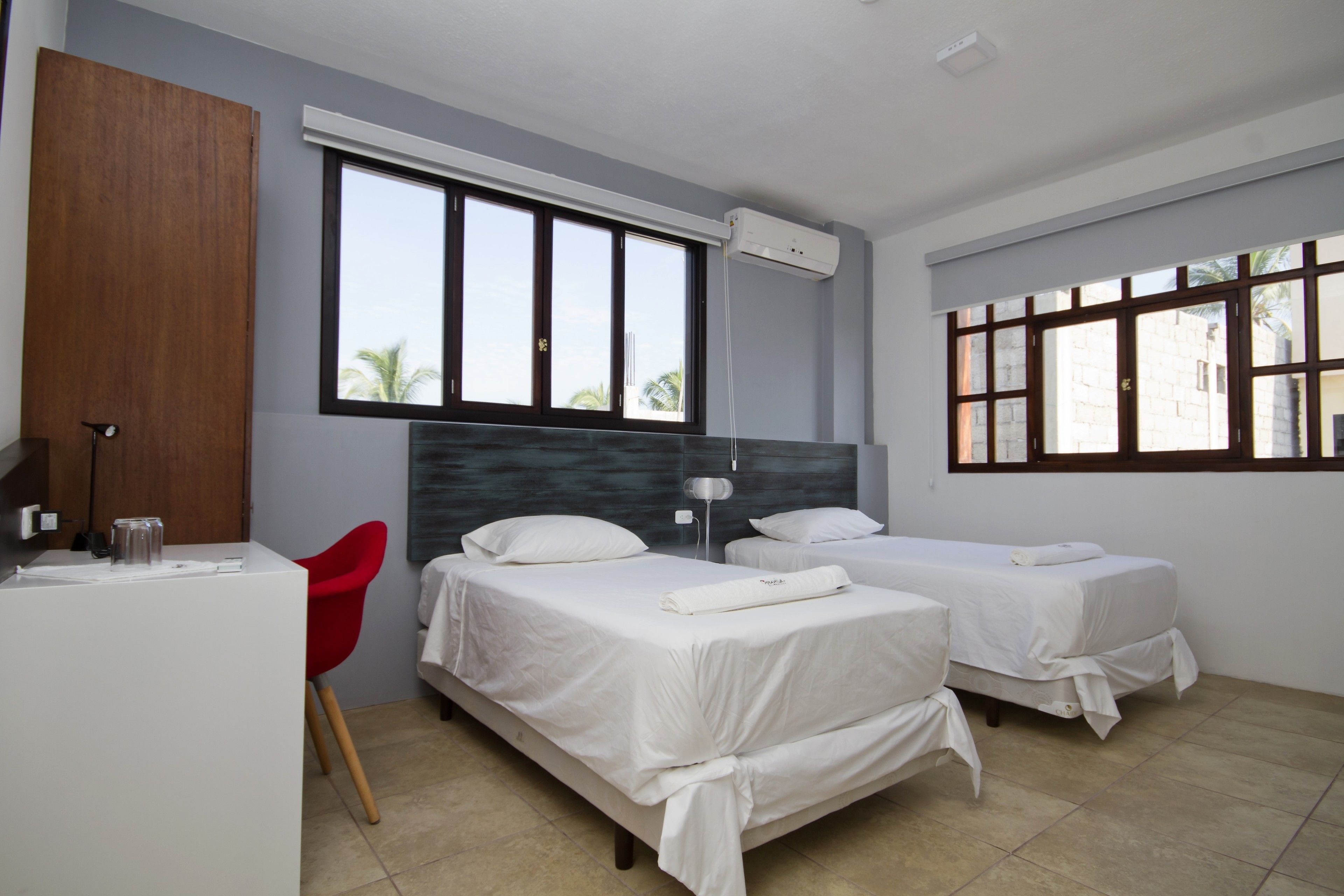 standard twin room | premium bedding, down duvets, memory-foam beds, in-room safe