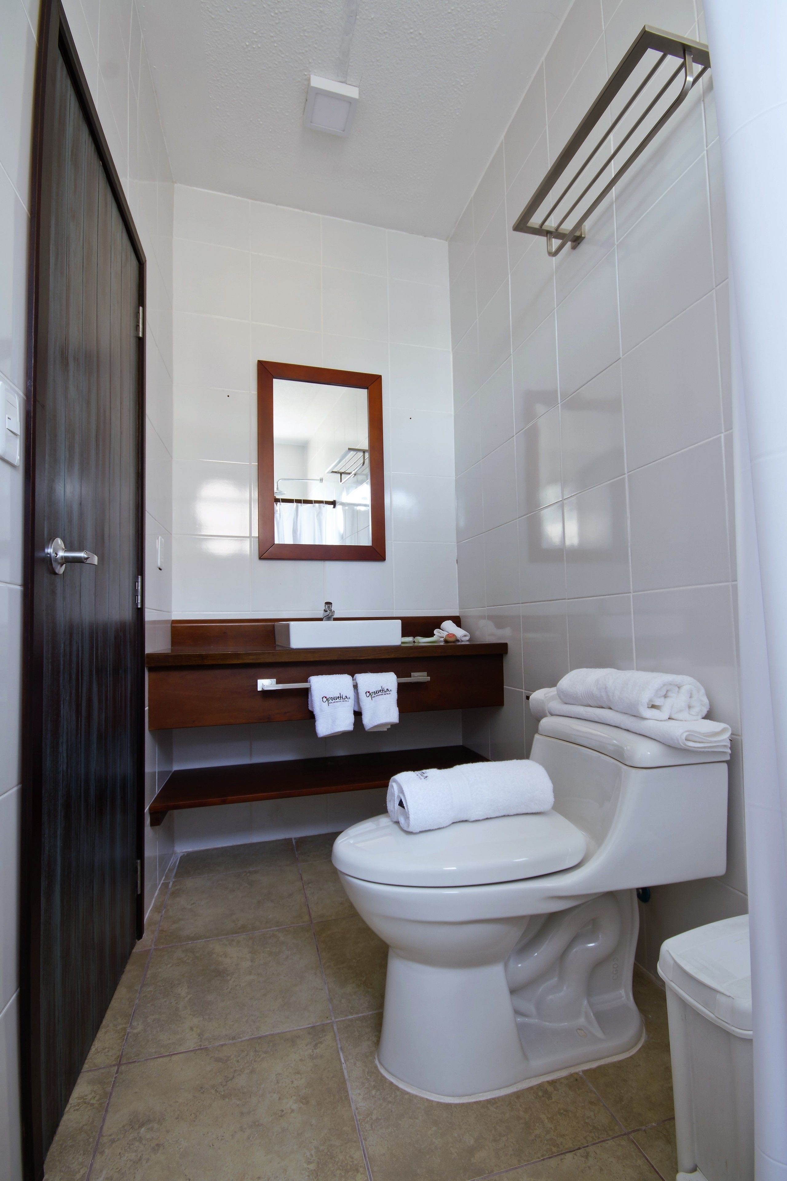 standard twin room | bathroom | shower, rainfall showerhead, hair dryer, towels