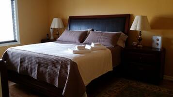 One King Bed | 3 bedrooms, in-room safe, desk, iron/ironing board