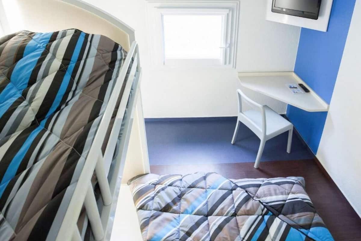 Triple Room, Shared Bathroom (Trio) | Desk, blackout curtains, free WiFi